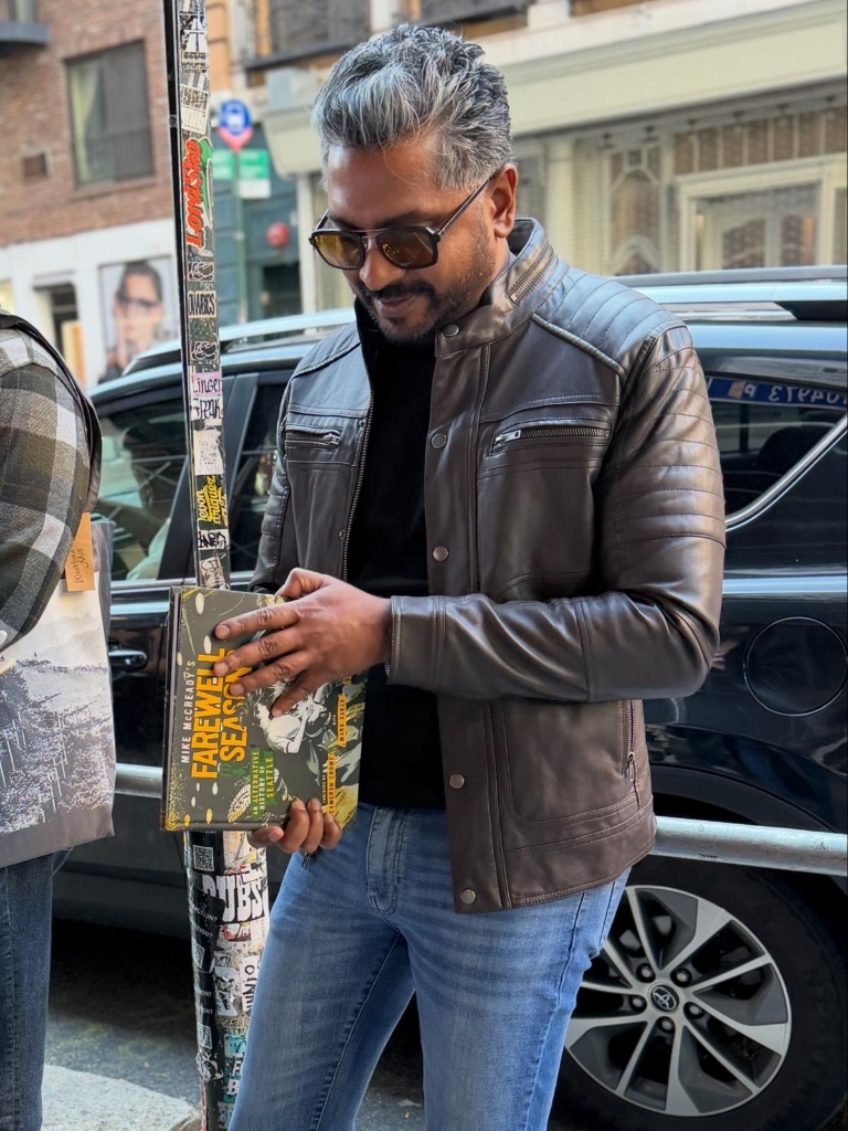 Laji George with Mike McCready Farewell to Season book